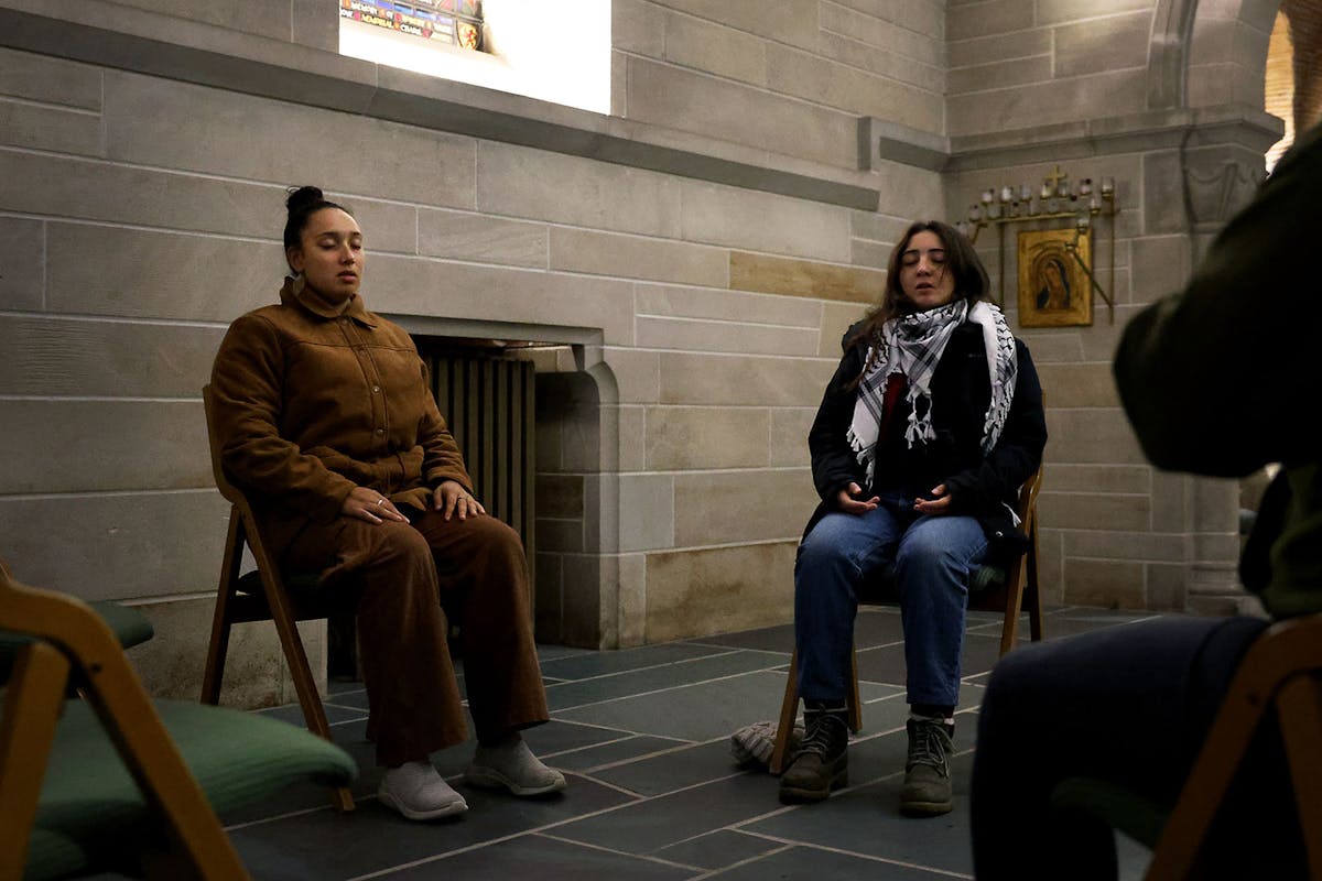 Shanti Harrison ’28, left, and Alia Dahleez ’28 attend Chaplain Kate Holbrook’s “Quijong Sound Healing” at Shove Chapel the day after the 2024 election. Meditation groups around campus, therapy at the Wellness Resource Center, and Butler Center gatherings were available and seemingly appreciated for those who needed support. Photo by Jamie Cotten / Colorado College